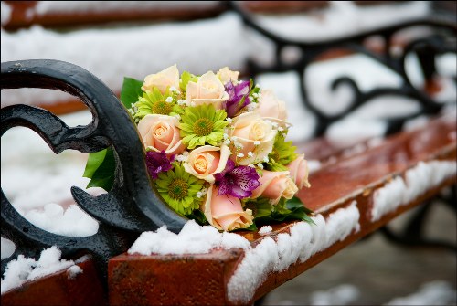 Local florist arranging flowers for delivery