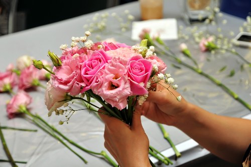 Florist preparing a vibrant flower arrangement